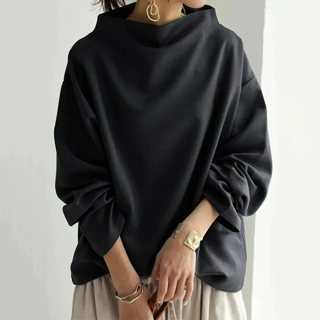 KL | Jersey negro con escote redondo oversize