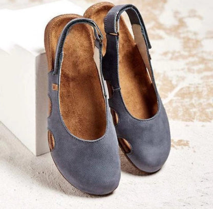 KL | Sandalias con tiras en la espalda