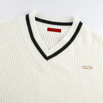 CM | MW - Elegante jersey con cuello en V