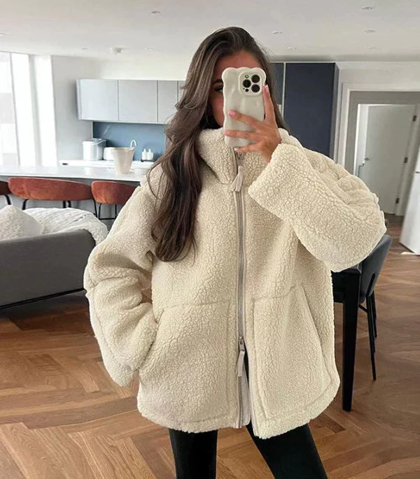 CM | Chaqueta con cremallera y cuello alto