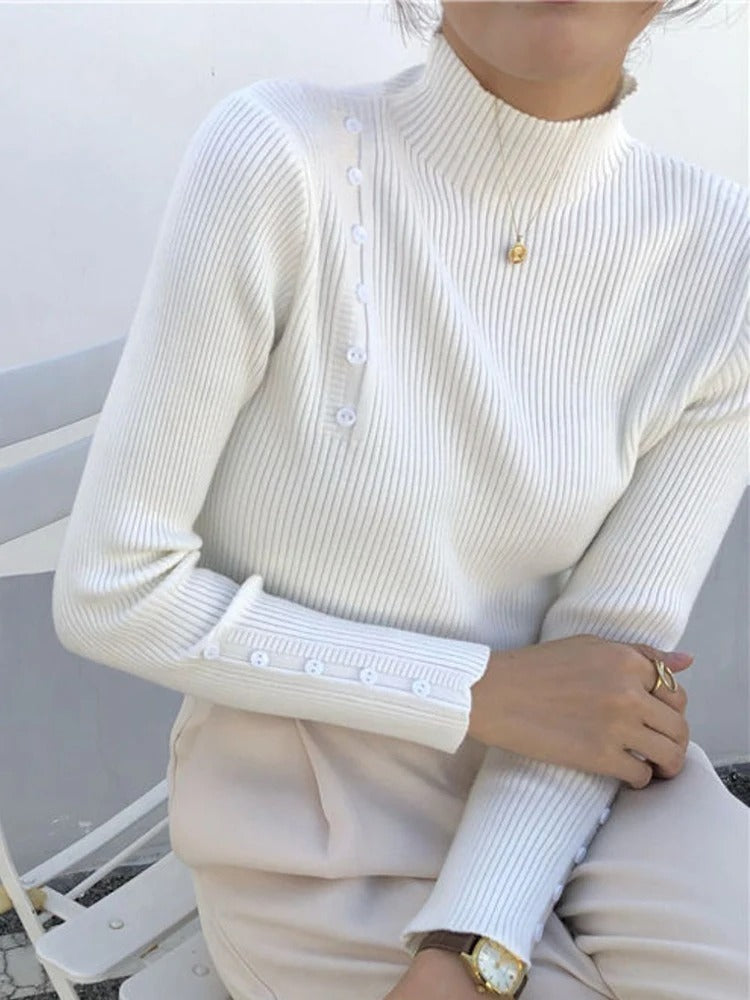 CM | MW - Elegante jersey con botones decorativos y cuello alto