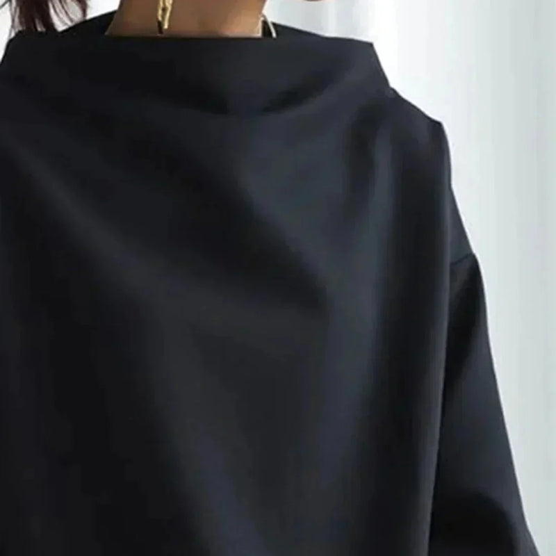 CM | Jersey negro con escote redondo oversize