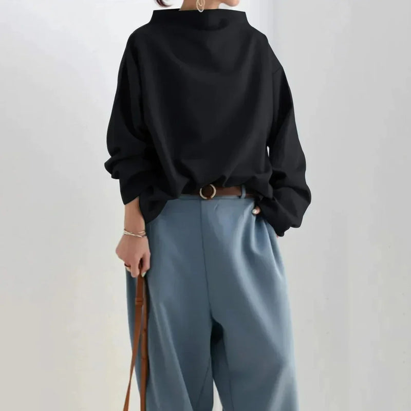 CM | Jersey negro con escote redondo oversize