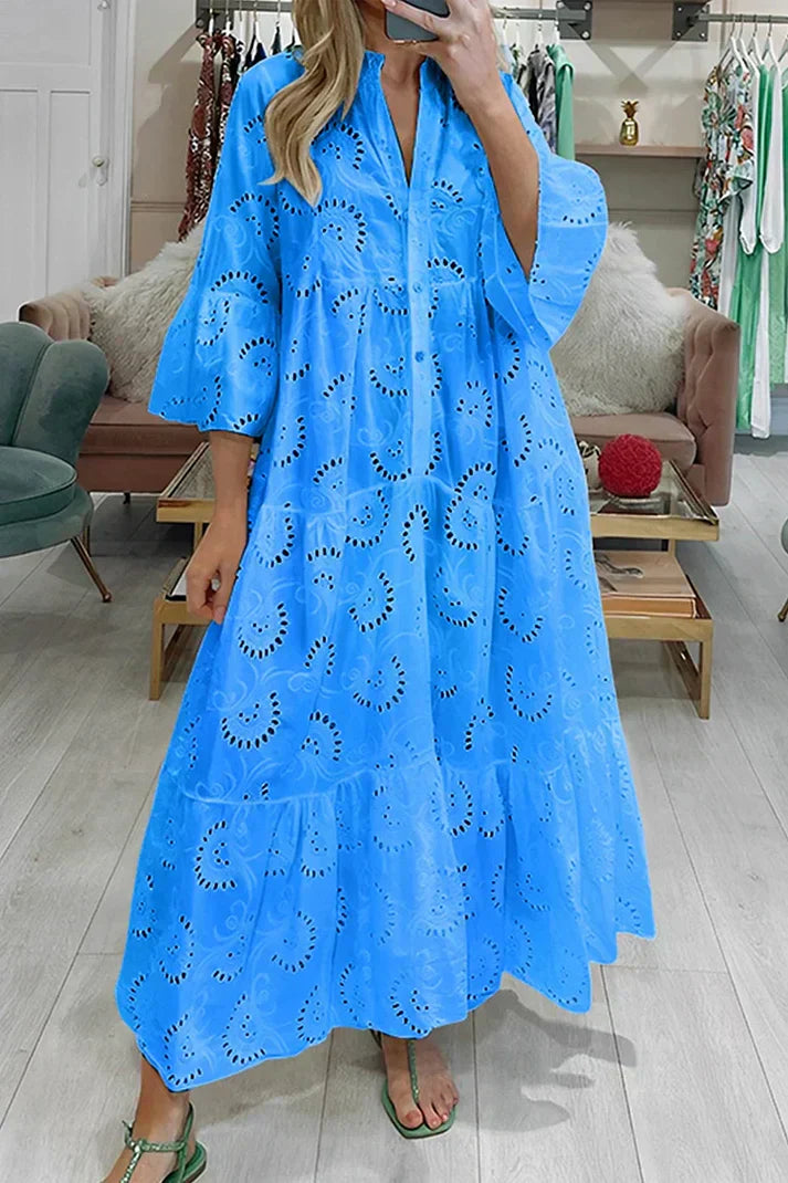 KL | Elegante vestido con ojales bordados