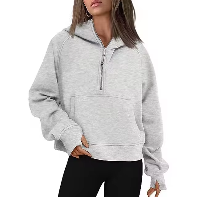 CM | Chaqueta con media cremallera y capucha