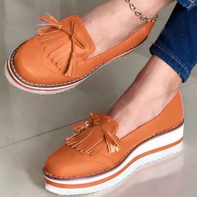 KL | Elegantes mocasines con borlas