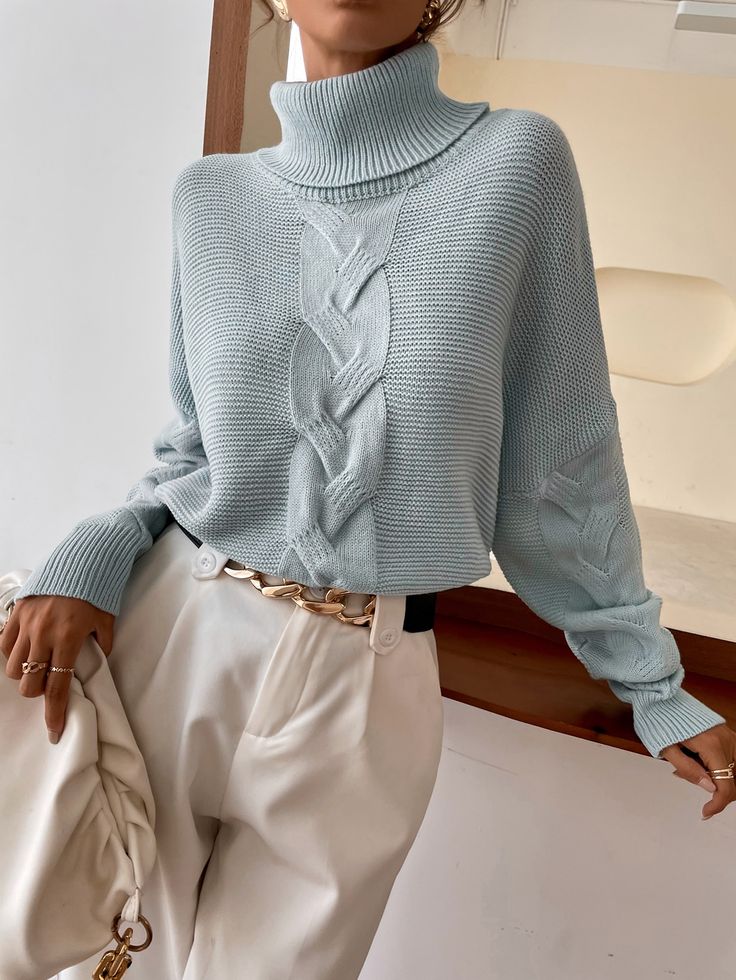 Jersey de algodón con trenzas, detalle trenzado central y cuello alto