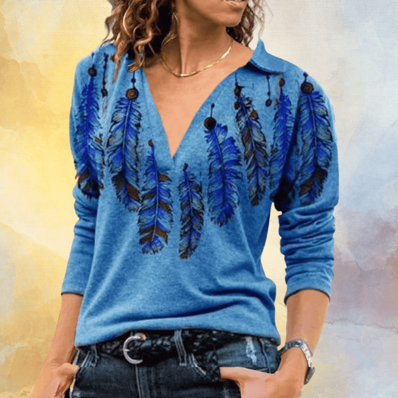 CM | Jersey azul con estampado de plumas