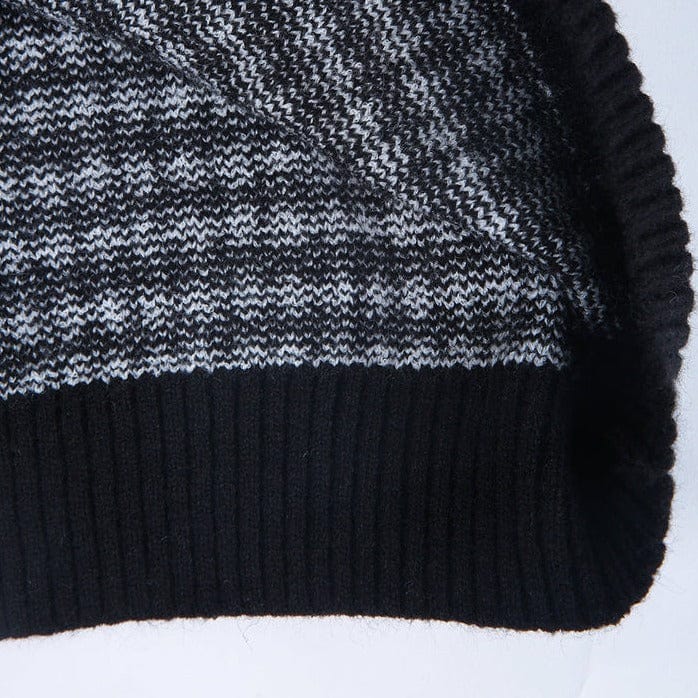 CM | Elegante jersey con estampado de cuadros blancos y negros