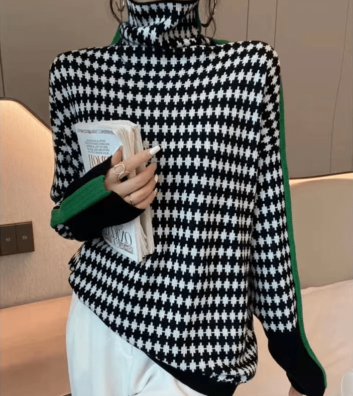 CM | Elegante jersey con estampado de cuadros blancos y negros