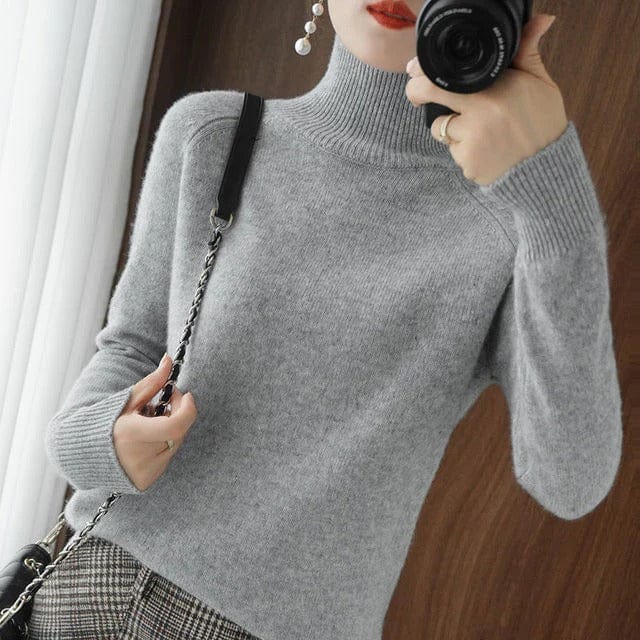 CM | Elegante jersey de cuello alto