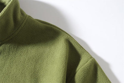 CM | Jersey de cuello alto con cremallera