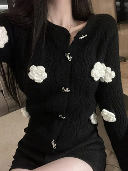 CM | Elegante jersey negro con flores en 3D y diseño de un solo pecho